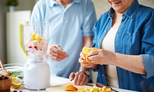 Elderly Couple Making a Smoothie.