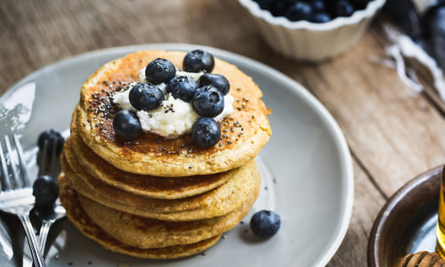 Stack of Pancakes with Blueberries on Top.