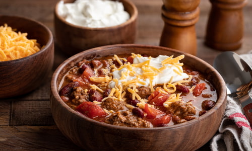 Chili with sour cream and cheese.